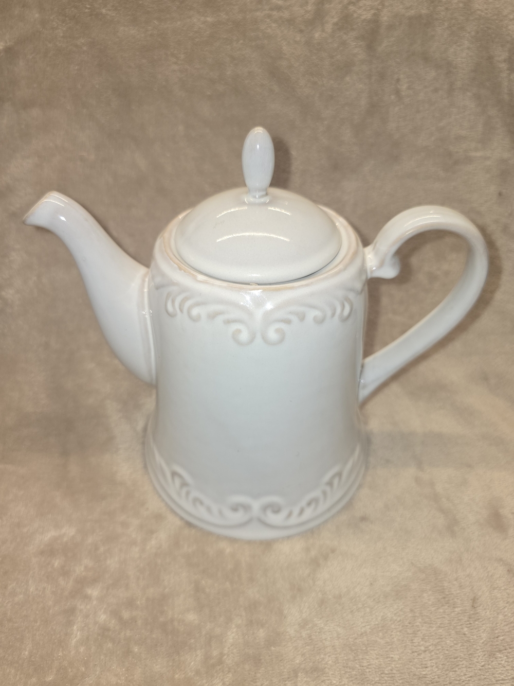 White Ceramic Teapot with Scroll Embossed Detail